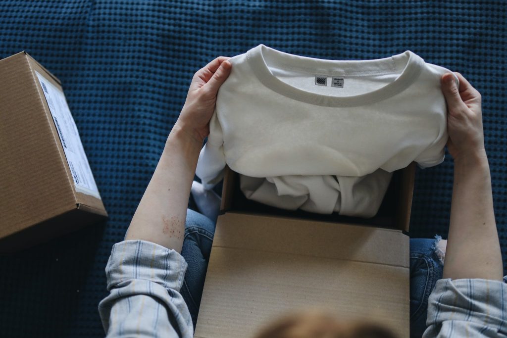 Veddys, A Person Opening a Package